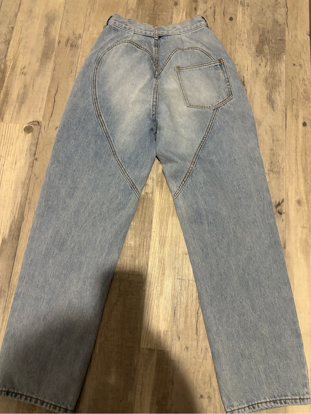 AREA Light Wash High‑Rise Jeans with Embellished Cutouts - Picture 3 of 5